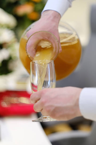 istock Waiter pouring juice 1137944518