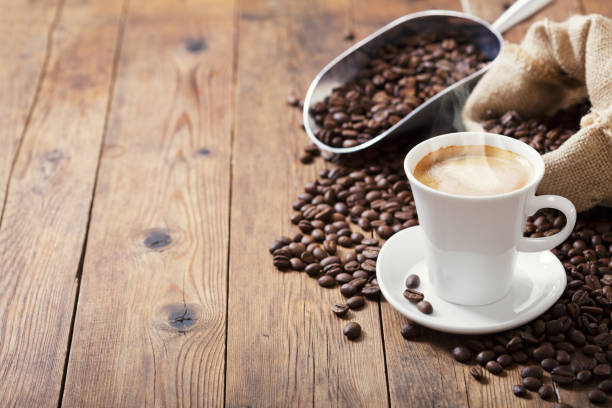 istock cup of coffee and coffee beans 1137945200