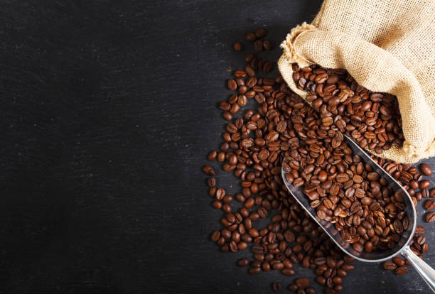 coffee beans in a sack, top view stock photo