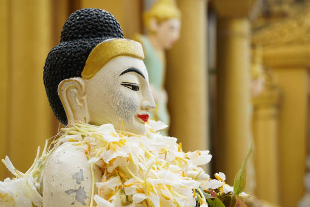 istock buddha image statue at Shwedagon Pagoda temple, Myanmar 1137946291