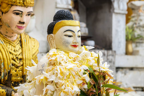 istock buddha image statue at Shwedagon Pagoda temple, Myanmar 1137946993