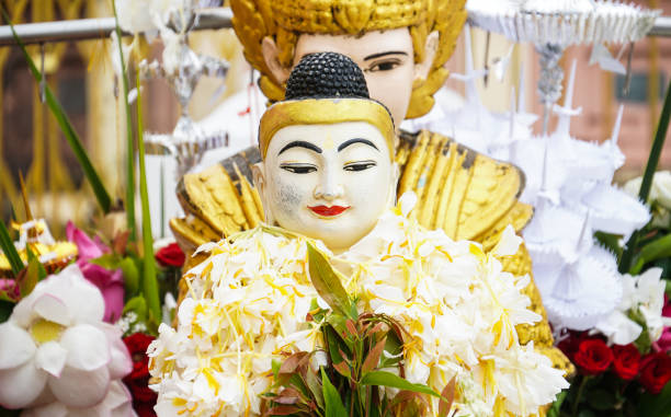 istock buddha image statue at Shwedagon Pagoda temple, Myanmar 1137947205