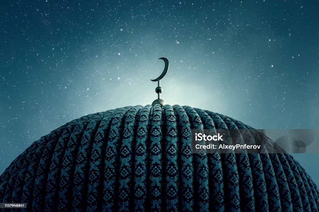 Dome of an old Mosque in the Night with stars on the Sky Islam Stock Photo
