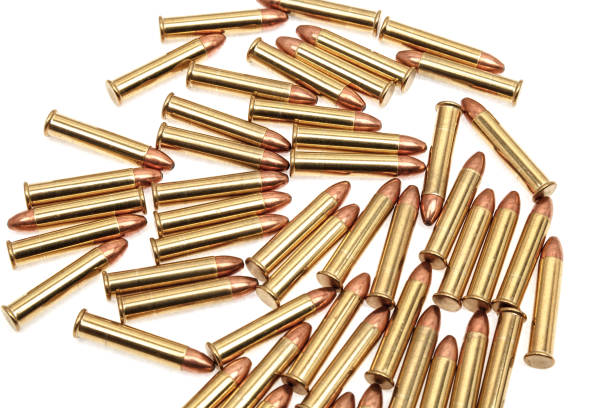 istock Small-caliber rifle cartridges isolated on white background 1137949515