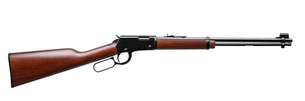 istock Old American wild west rifle isolated on white background 1137949631