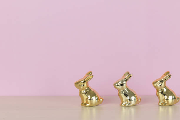 istock Easter Bunny background gold pink 1137950761