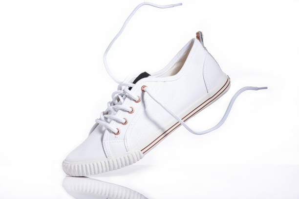 istock Women's sneakers on a white background. 1137953243