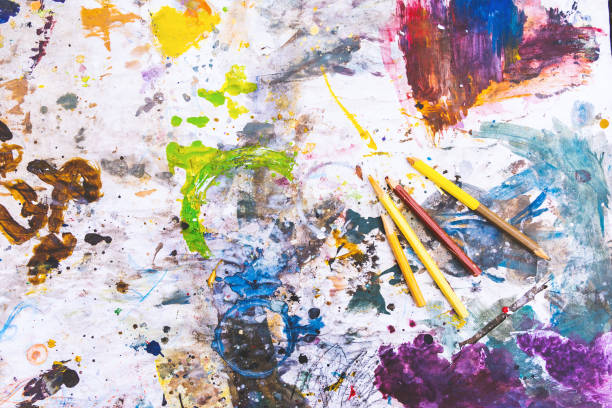 istock Color fragments stained on paper from art. 1137953395