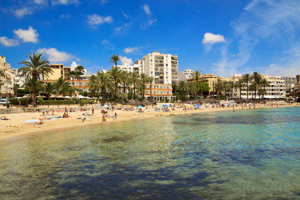 ses figueretes beach in ibiza town in sunny summer morning - ibiza town imagens e fotografias de stock