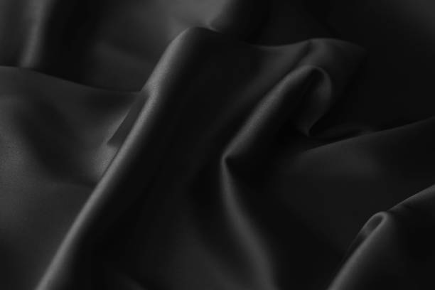 istock Black luxury wavy rippled glossy silk drapery cloth fabric 1137956674