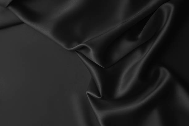 istock Black luxury wavy rippled glossy silk drapery cloth fabric 1137957059