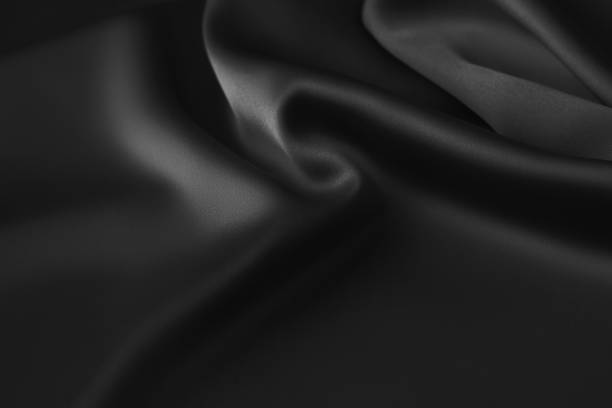 istock Black luxury wavy rippled glossy silk drapery cloth fabric 1137957069