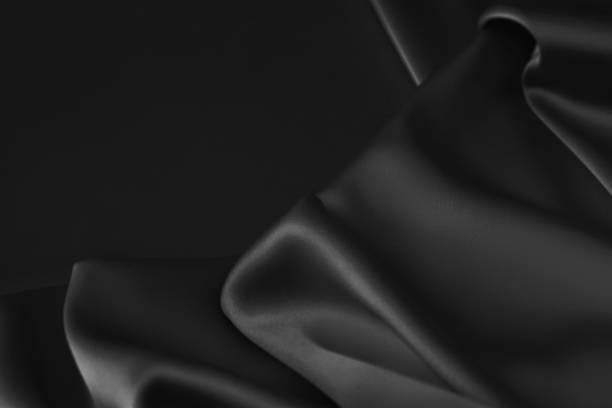 istock Black luxury wavy rippled glossy silk drapery cloth fabric 1137957081