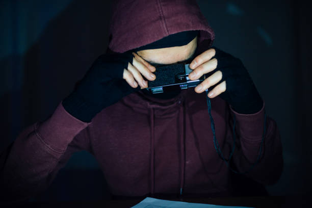 istock Man in Hoodie Picking up Information's 1137957892
