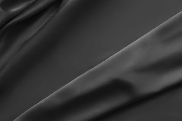 istock Black luxury wavy rippled glossy silk drapery cloth fabric 1137957924