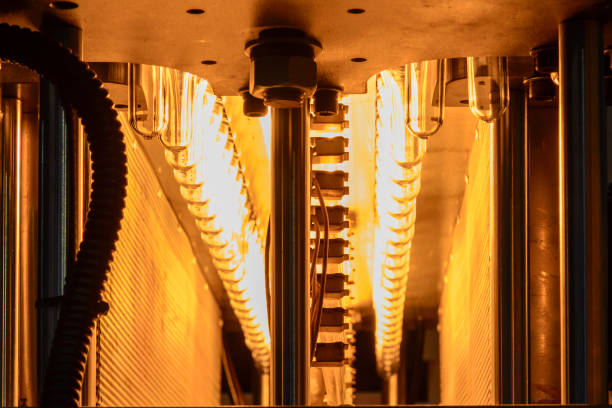 istock The  preform shape of plastic bottles  in the conveyor belt  for heating process. 1137958356