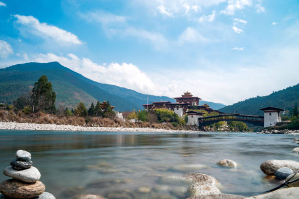 istock Punakha Dzong featuring serene river and traditional cantilever bridge 1137958438