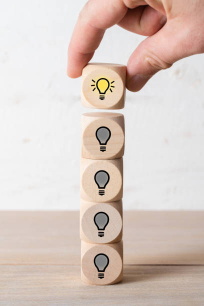 istock many people together having an idea symbolized by icons on cubes 1137959205