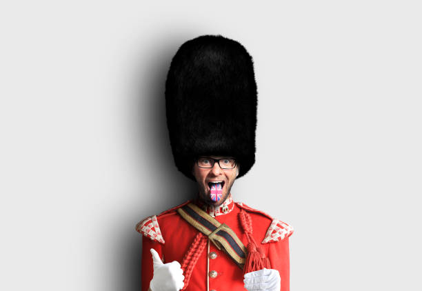 Young man in the costume of the Royal guards stock photo