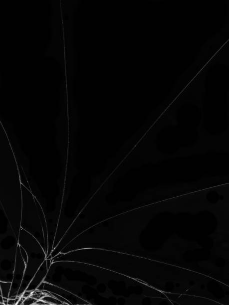 istock Cracked glass texture on black background 1137965093