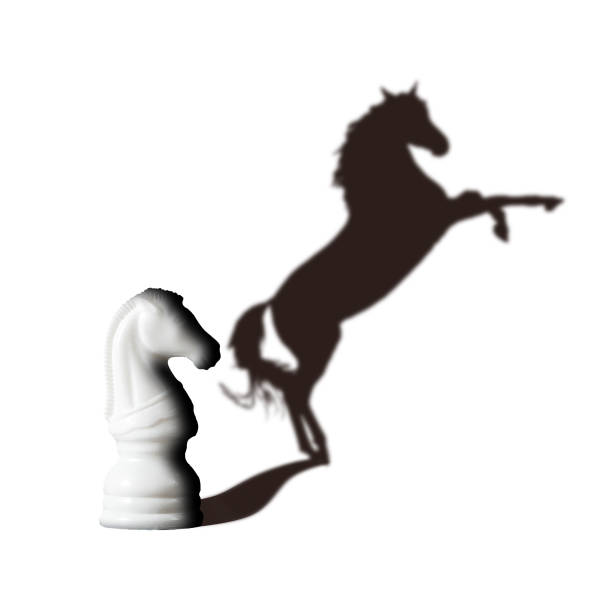istock Chess horse with shadow as a wild horse on white. Vision Potentiality concept 1137967815