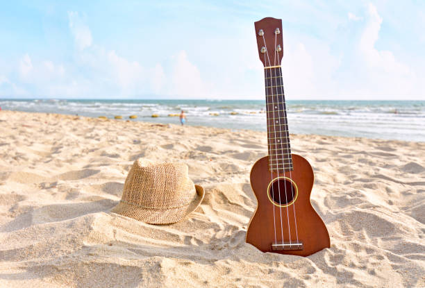 istock Summer Vacation with Guitar ukulele for relax on the beautiful beach 1137968223