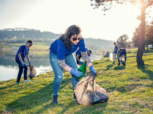 istock Volunteers collecting garbage 1137968776