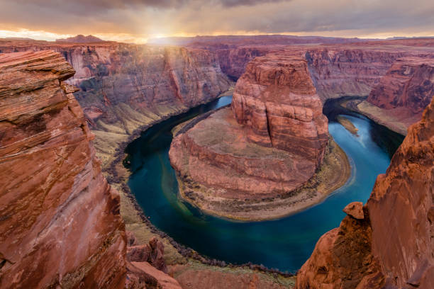 Sunset at Horseshoe Bend, near Page, Arizona Sunset at Horseshoe Bend, near Page, Arizona. horseshoe canyon stock pictures, royalty-free photos & images