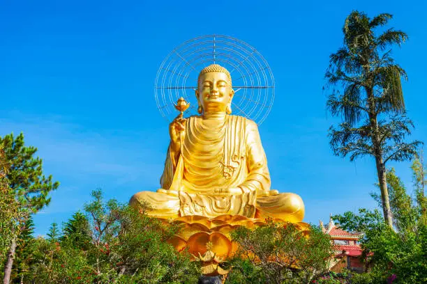The Golden Buddha statue or Thien vien Van Hanh in Dalat city in Vietnam
