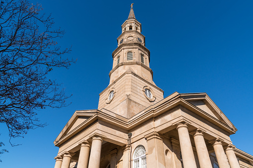 Steeple of historic St Phillip's Church along Church Street in Charleston, SC