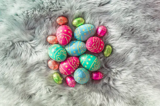 Multiple colored Easter eggs on fur, pink, blue and green eggs, Amsterdam the Netherlands 2019