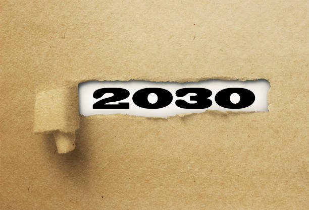 istock ripped or torn paper revealing new year 2030 on white background 1137972698