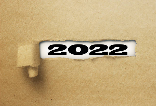 istock ripped or torn paper revealing new year 2022 on white background 1137972702