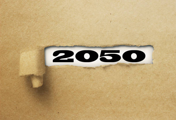 istock ripped or torn paper revealing new year 2050 on white background 1137972721