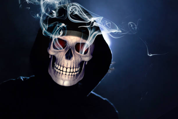 istock Scary hooded human skull. Death Portrait at night 1137972730