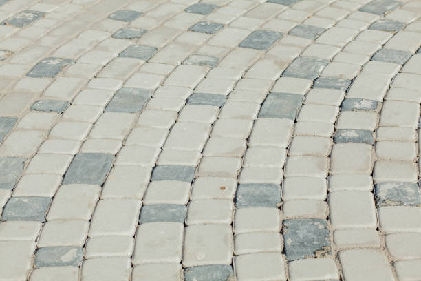 istock Abstract background of old cobblestone pavement view from above 1137972805