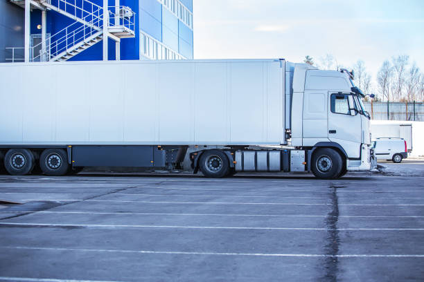 istock truck is loaded at a large warehouse 1137974054