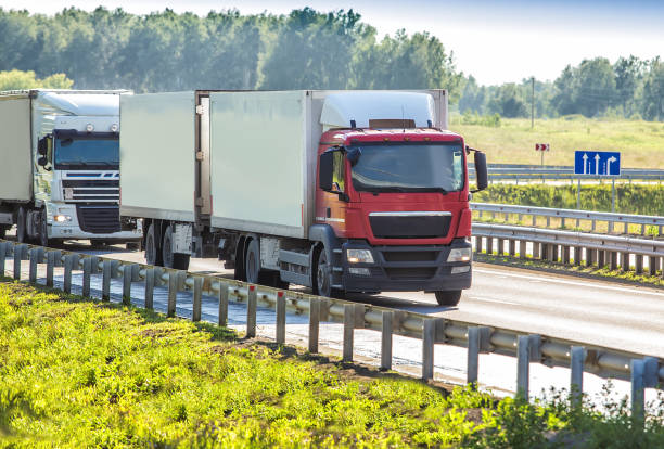 istock trucks goes on the highway 1137974353