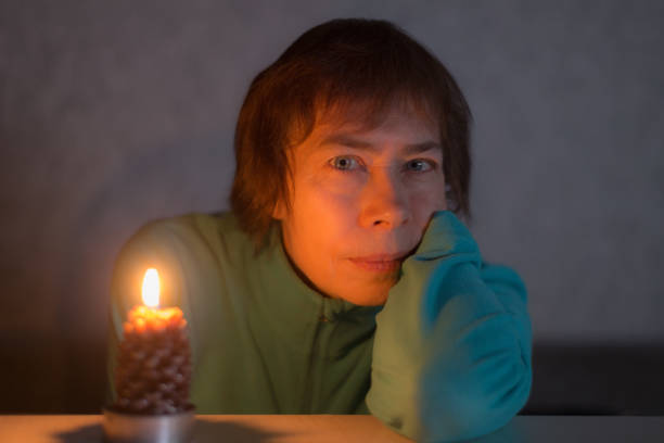 istock woman by candlelight 1137977026