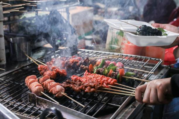 Street food grill on road side