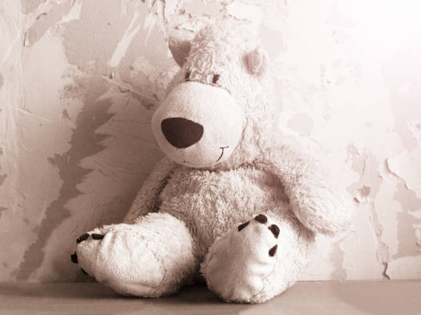 istock A sad soft toy bear in the old room 1137978990