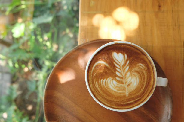 istock Hot latte art on wooden tray 1137979242