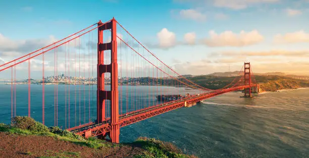 The Golden Gate Bridge, standing on the Golden Gate Strait in San Francisco, California, USA, is one of the world's famous bridges and a miracle of modern bridge engineering