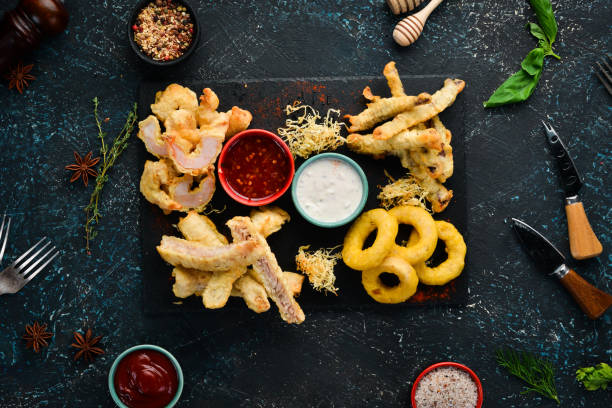 istock Baked Seafood. squid, shrimp, salmon. Top view. Free space for your text. Rustic style. 1137986057