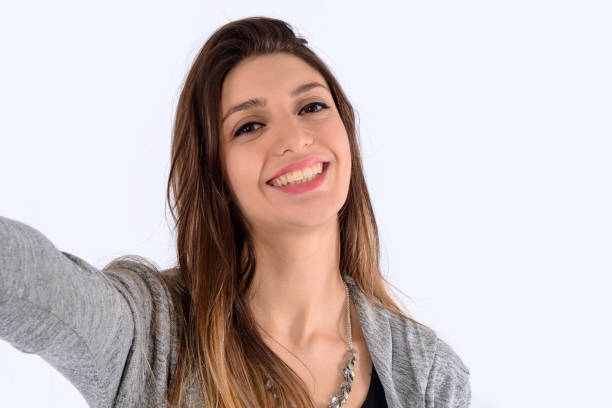 istock Young woman taking selfie 1137986960
