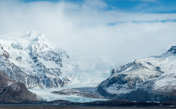 istock Icelandic Landscape with glacier and snow capped mountains 1137988361