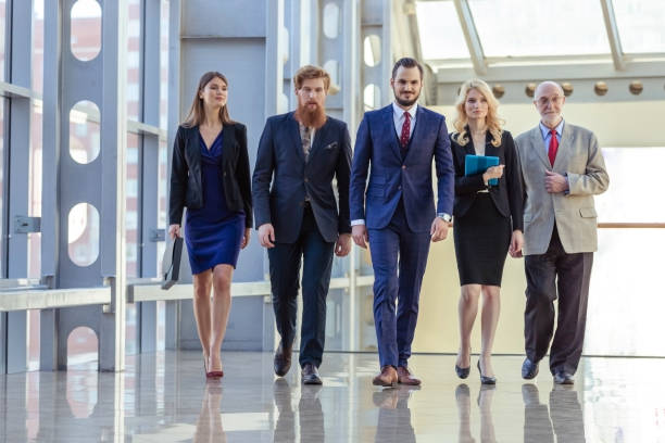 Business people walking the corridor