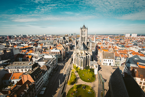Aerial panoramic view of the historic city of Ghent on a beautiful sunny day with blue sky and clouds in summer, province of East Flanders, Belgium