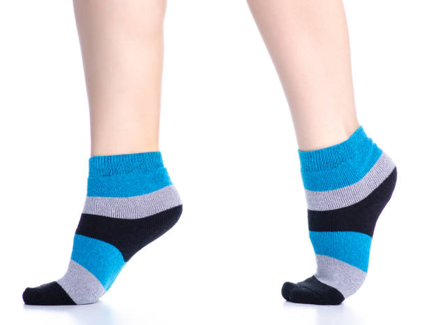 istock Female legs with socks fashion 1137991821