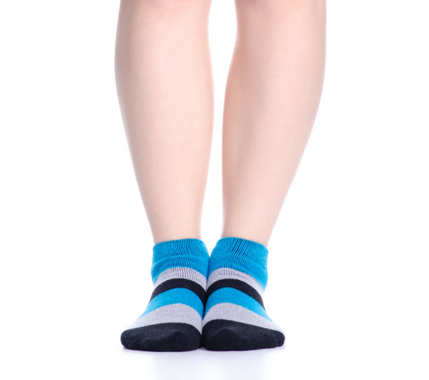 istock Female legs with socks fashion 1137991848